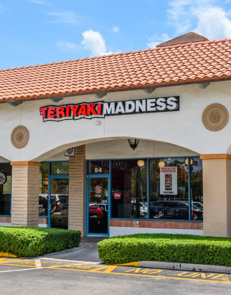 The outside of a Teriyaki Madness Restaurant in Boca Raton